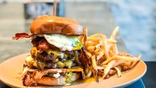 The off-menu Frankenstein burger at Butcher & Brew has three patties — and so much more. CONTRIBUTED BY BUTCHER & BREW
