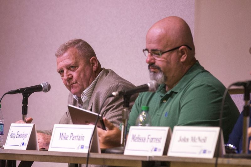 Retired Master Sergeant Jerry Ensminger, far left, speaks a forum about water contamination at Camp Lejeune at the Emory conference center in Atlanta, Tuesday, Feb. 27, 2018. Ensminger is seeking a new law that will mitigate the impact of a 2014 U.S. Supreme Court decision that effectively blocked Lejeune families from seeking relief through the courts. ALYSSA POINTER/ALYSSA.POINTER@AJC.COM