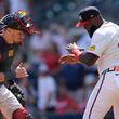 Atlanta Braves' Sean Murphy, left, and designated hitter Marcell Ozuna (20) celebrate after defeating the Oakland Athletics in a baseball game Sunday, June 2, 2024, in Atlanta. (AP Photo/John Bazemore)