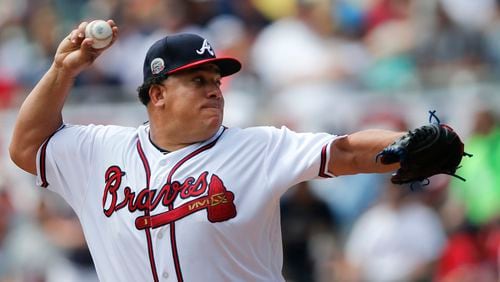 Atlanta Braves starting pitcher Bartolo Colon works in the first inning of a baseball game against the San Diego Padres Sunday, April 16, 2017, in Atlanta. (AP Photo/John Bazemore)