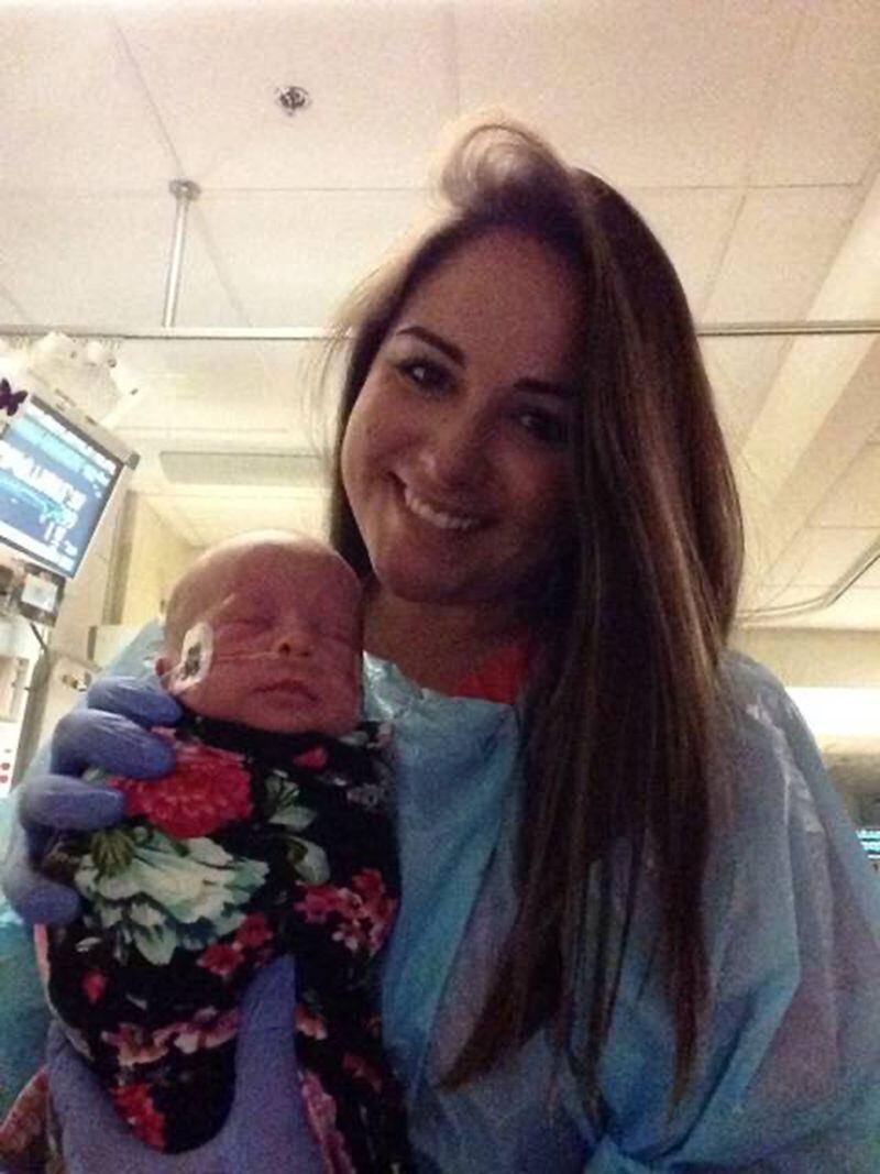 Jamie Michetti with Camille in early July, during what she thought at the time was going to be her last shift with Flowers' baby. (Courtesy The Flower Family/TNS)