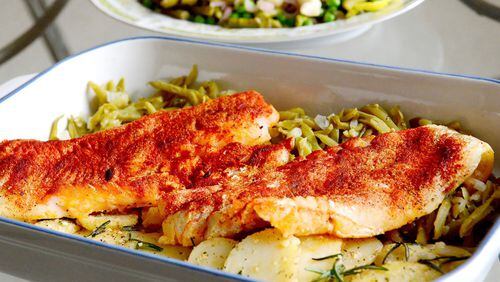 Serve paprika cod fillets with fried rosemary-topped potatoes and green beans cooked in chicken stock and minced shallots. (Lake Fong/Pittsburgh Post-Gazette/TNS)