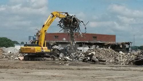 A demolition company chopped, smashed and crushed most of the 3.6 million square feet of buildings at GM’s former assembly plant in Doraville. MATT KEMPNER / MATTHEW.KEMPNER@AJC.COM