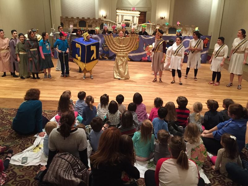 Who doesn’t love a holiday play? Preschoolers at The Temple in Midtown perform the Chanukah story for family and friends. 
Courtesy of The Temple