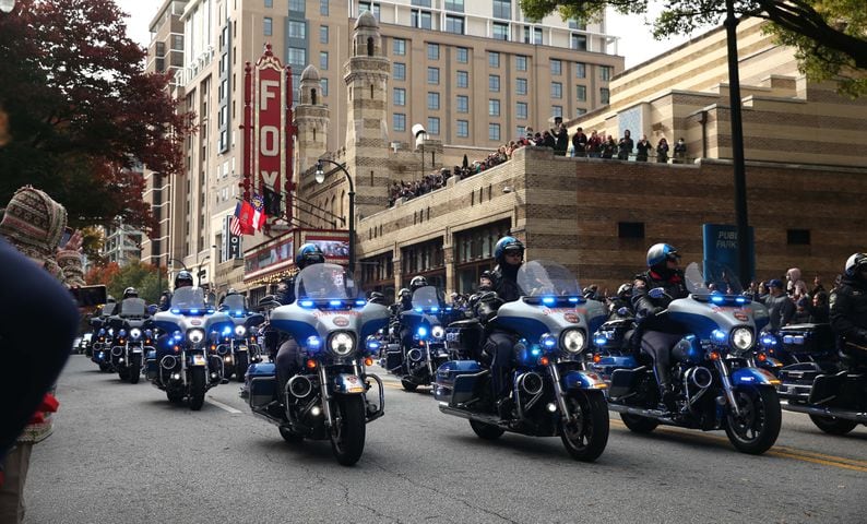 Police cruise down Peachtree Street during the Braves' World Series parade in Atlanta, Georgia, on Friday, Nov. 5, 2021. (Photo/Austin Steele for the Atlanta Journal Constitution)