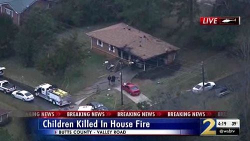Two children were killed in a house fire in Butts County.