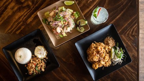 Rickshaw Thai Street Food, now open in Alpharetta, has a menu that includes (from left) Street Basil Chicken, Yum Woon Sen and Shrimp Pad Thai. Shown with them is a Thai on Fire cocktail. (Mia Yakel for The Atlanta Journal-Constitution)