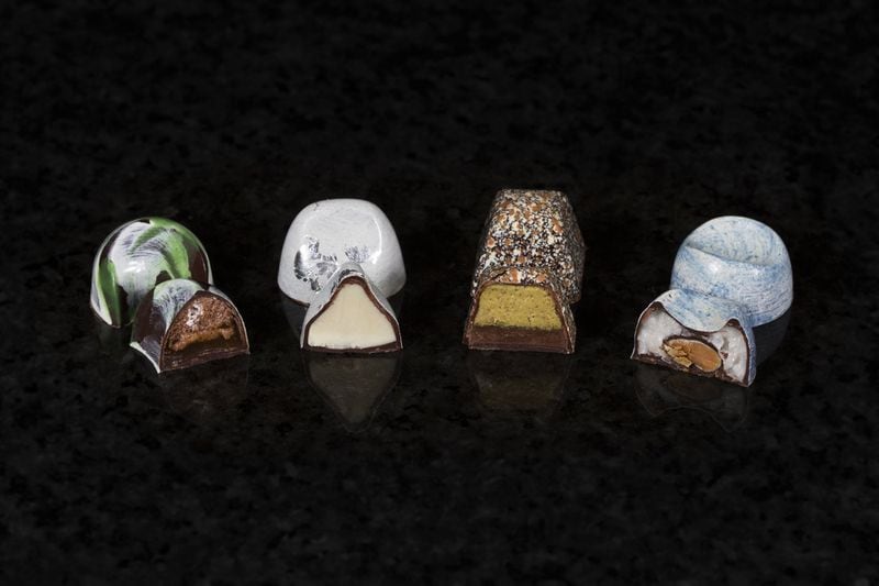 Each Jardi Chocolates bonbon is hand-painted. This collection of treats showcases layered fillings inside speckled, swirled and marbled chocolate shells. CONTRIBUTED BY RICHARDSON MEDIA HOUSE