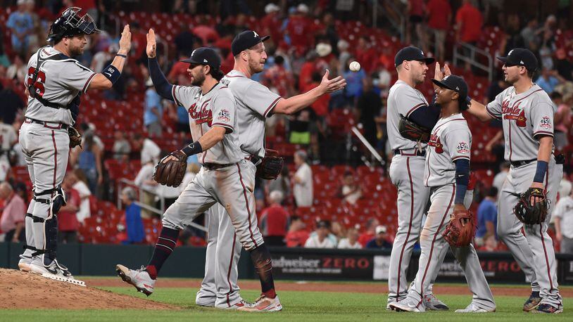Atlanta Braves celebrate the team's victory over the St. Louis Cardinals Wednesday, Aug. 4, 2021, in St. Louis. (Joe Puetz/AP)