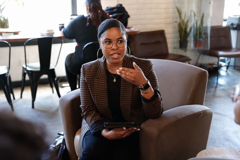 AJC Black Culture correspondent Naija Parker speaks during a roundtable discussion about the Fani Willis hearings with local Black women at Black Coffee in Atlanta on Thursday, March 7, 2024. (Natrice Miller/ Natrice.miller@ajc.com)
