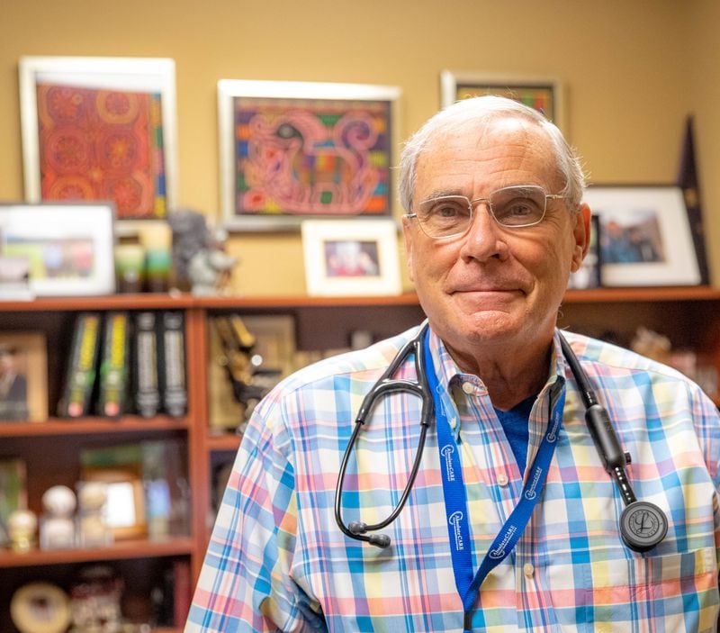 Dr. Joel Rosenstock, an infectious disease specialist, poses for a portrait in his office at AbsoluteCare on Peachtree Street where he treats many people with long COVID symptoms which can be agonizing and debilitating.
 (Jenni Girtman for The Atlanta  Journal-Constitution)