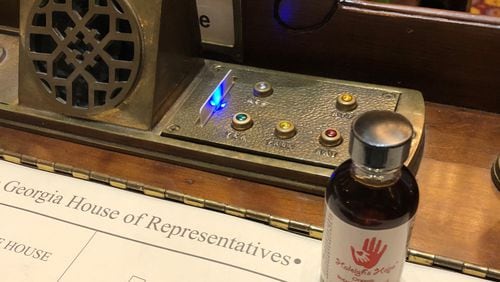 A vial of cannabis oil sat on Allen Peake's desk on Thursday night, as his legislative career came to a close. Photo courtesy of Allen Peake