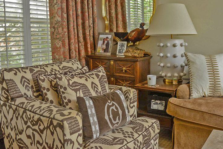 Photos: Buckhead condo owner treasures her estate sale finds, classic interiors