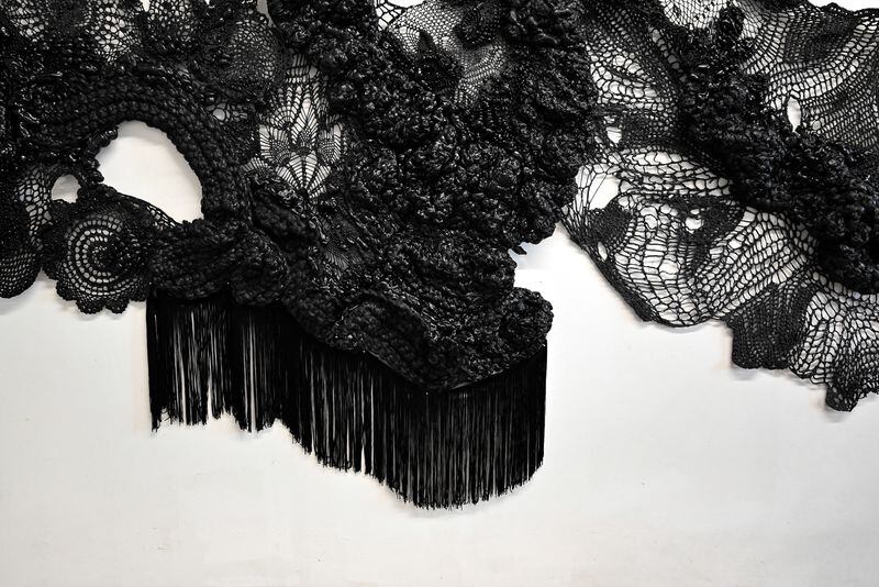 Hannah Ehrlich's exhibit at Sandler Hudson Gallery includes the large wall installation "Never alone: accompanied by grief" (2023) of which a detail is seen here.