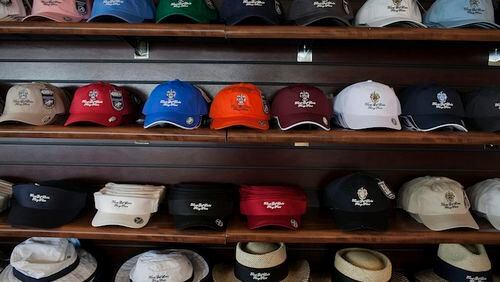 Trump-branded hats are for sale in the clubhouse at the Trump Links golf course in the Bronx borough of New York on March 31, 2015. (MUST CREDIT: Bloomberg photo by Victor J. Blue)