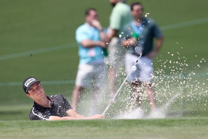 April 7, 2021, Augusta: Viktor Hovland hits out of the bunker on the second hole during his practice round for the Masters at Augusta National Golf Club on Wednesday, April 7, 2021, in Augusta. Curtis Compton/ccompton@ajc.com