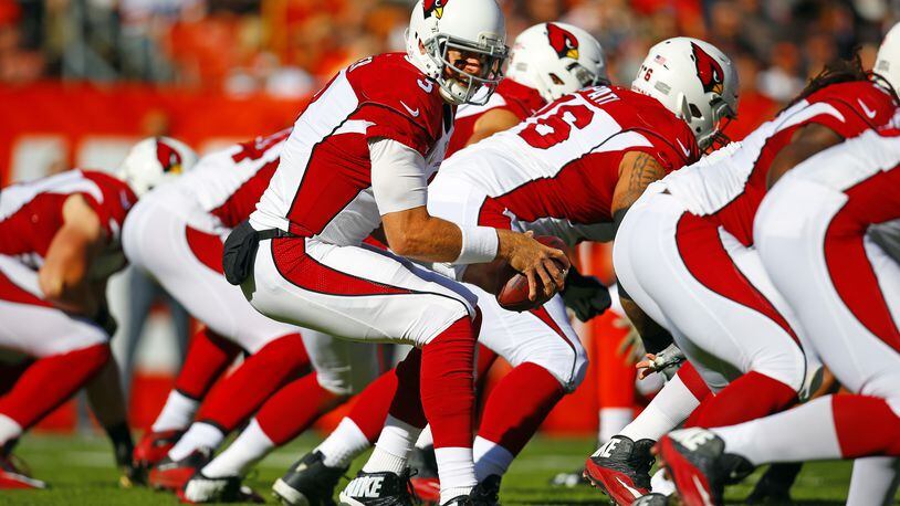 Arizona Cardinals quarterback Carson Palmer (3) takes the snap against the Cleveland Browns during an NFL football game Sunday, Nov. 1, 2015, in Cleveland. Arizona won 34-20. (Jeff Haynes/AP Images for Panini)