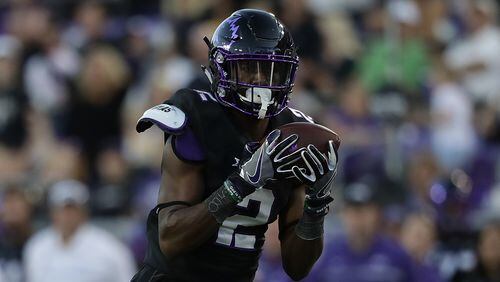 Taj Williams  of the TCU Horned Frogs makes a touchdown pass reception against the Oklahoma Sooners in the second half at Amon G. Carter Stadium on October 1, 2016 in Fort Worth, Texas.  (Photo by Ronald Martinez/Getty Images)