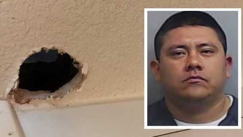 Christian Garcia Castillo (right) was arrested by Roswell police after allegedly peering at a woman through a hole in the wall of a hotel.