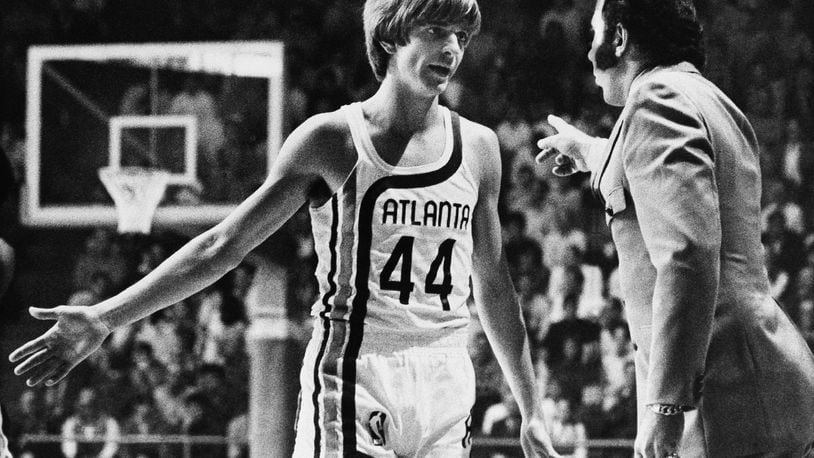 Before making his debut into professional basketball, “Pistol” Pete Maravich receives last minute instructions from Coach Richie Guerin, in Atlanta, Oct. 20, 1970. (AP Photo/Toby Massey)