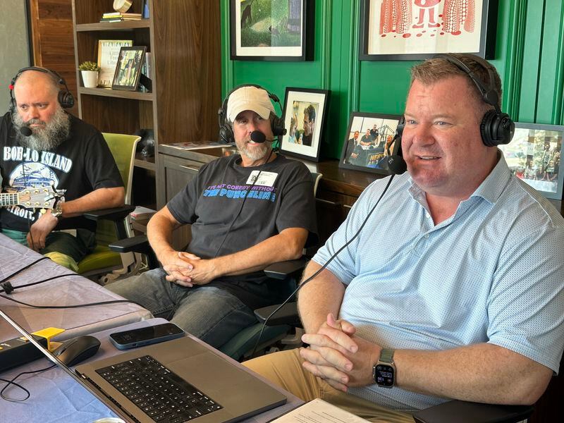 Erick Erickson of WSB (right) during the annual Care-a-thon for  the Aflac Cancer and Blood Disorders Center on July 28, 2023. He is talking to comic J. Chris Newberg (left) and Punchline owner Jamie Bendall. RODNEY HO/rho@ajc.com