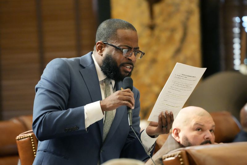 Mississippi State Rep. Fabian Nelson, D-Jackson, asks for a clarification on a bill to regulate transgender people's use of bathrooms, locker rooms and dormitories in public education buildings, before the House at the state Capitol in Jackson, Miss., Thursday, May 2, 2024. (AP Photo/Rogelio V. Solis)