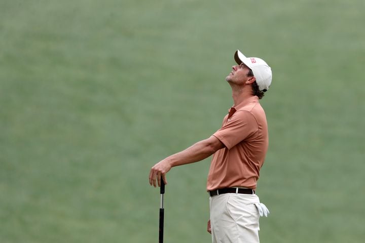 April 8, 2021, Augusta: Adam Scott reacts to missing his birdie putt on the tenth hole during the first round of the Masters at Augusta National Golf Club on Thursday, April 8, 2021, in Augusta. Curtis Compton/ccompton@ajc.com