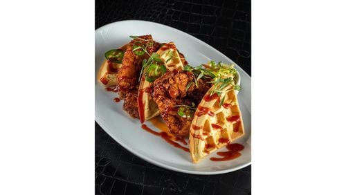 Hot chicken and waffles from STK. Courtesy of STK.