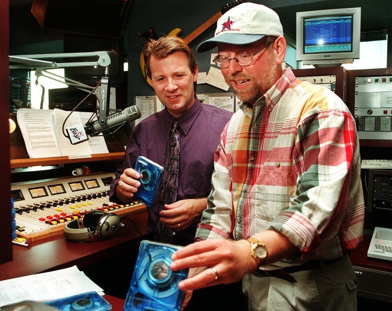 980922 - Atlanta, Georgia - Randy (left) and Spiff, the Fox 97 morning team, look over their music selections during a break in the show on September 22, 1998. (AJC Staff Photo/Phil Skinner)