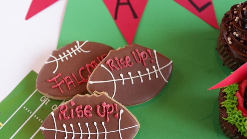 The pastry chef at Corner Cafe is going all-out with Falcons-themed treats, which means everything from chocolate-dipped strawberry footballs to #RiseUp cookies, and cupcakes topped with custom-made Falcons helmets and “grass” frosting.