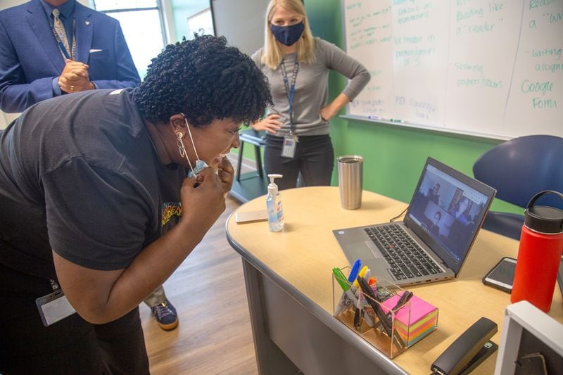 Atlanta Public Schools Superintendent Lisa Herring talks with Kiersten Hellier-Hunter's 7th-grade class over Zoom on the first day of class at David T. Howard Middle School in August.  (STEVE SCHAEFER FOR THE ATLANTA JOURNAL-CONSTITUTION)