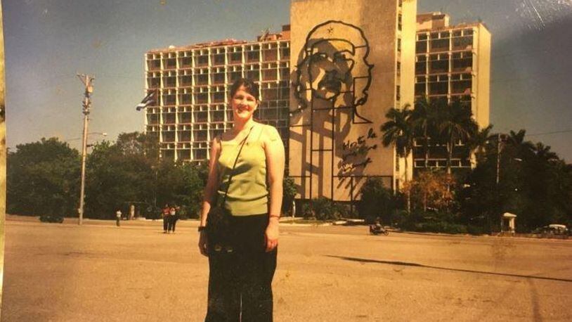 Dabney P. Evans, an assistant professor at Emory University’s Rollins School of Public Health, in 2003. She met Fidel Castro on a 2006 visit to Cuba. Here’s she is in front of an image of Marxist revolutionary Che Guevara on an Havana building. HANDOUT
