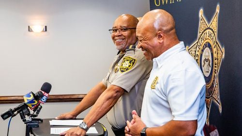 Gwinnett County Sheriff Keybo Taylor, left, addresses the press at the Gwinnett Sheriff's Office in Lawrenceville with Cobb County Sheriff Craig Owens, right, at his side on Tuesday, June 29, 2021.  Sheriff Taylor addresses an extortion lawsuit against him initiated by staff at a bail bonds company which has concluded, the bond service has retracted the lawsuit.  (Jenni Girtman for The Atlanta Journal-Constitution