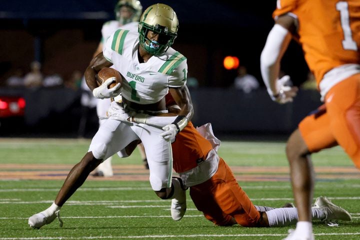 August 20, 2021 - Kennesaw, Ga: Buford wide receiver Isaiah Bond (1) makes a catch for a first down during the first half against North Cobb at North Cobb high school Friday, August 20, 2021 in Kennesaw, Ga.. JASON GETZ FOR THE ATLANTA JOURNAL-CONSTITUTION