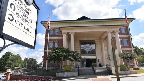 Lawrenceville’s City Hall sits near a proposed $200 million redevelopment project aimed at attracting residents to the downtown area. HYOSUB SHIN / HSHIN@AJC.COM