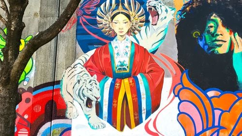 Trudy Tran's mural of a Vietnamese woman is one of the many murals that make the Cabbagetown community one of the best outdoor art viewing neighborhoods in the city.