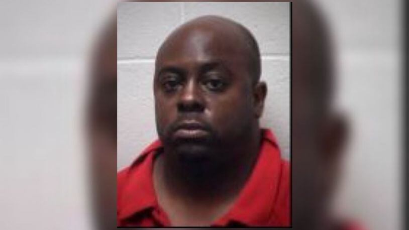 Larry Favors Jr, 39, was charged with murder in connection to the fatal shooting of Anthony Williams, 54, at Peachtree Peddlers antique mall, police said.