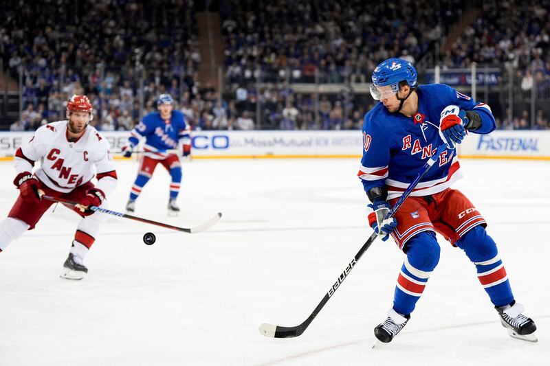 New York Rangers left wing Artemi Panarin (10) watches the puck during the second period in Game 2 of the team's NHL hockey Stanley Cup second-round playoff series against the Carolina Hurricanes, Tuesday, May 7, 2024, in New York. (AP Photo/Julia Nikhinson)