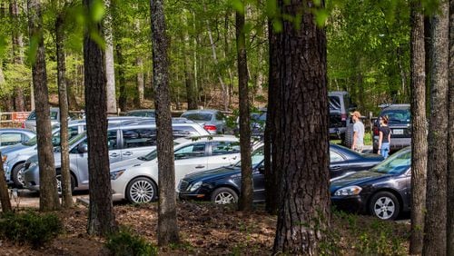 Hezli Holdings who owns property on Lakefield Drive plans to open a 13,000 square foot event center next door to the busy Six Bridges Brewing where parking spaces are taken quickly most weekends. Pictured is an image of the parking lot at Sweetwater Creek State Park. Jenni Girtman for The AJC