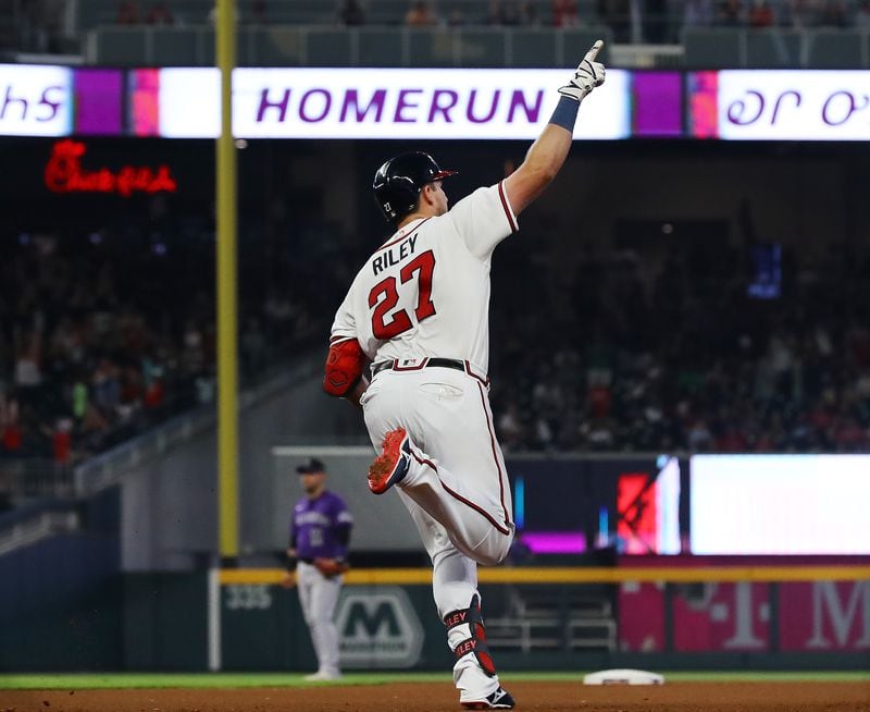 Braves third baseman Austin Riley hits a solo home run to take a 1-0 lead over the Colorado Rockies during the fourth inning in a MLB baseball game on Thursday, Sept. 1, 2022, in Atlanta.   “Curtis Compton / Curtis Compton@ajc.com