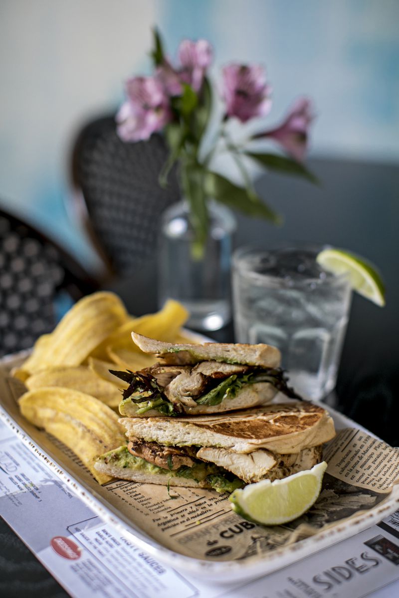  A mojo pollo sandwich from Beni’s Cubano combines mojo-grilled chicken, mixed greens, cilantro and avocado spread. Credit: Heidi Geldhauser