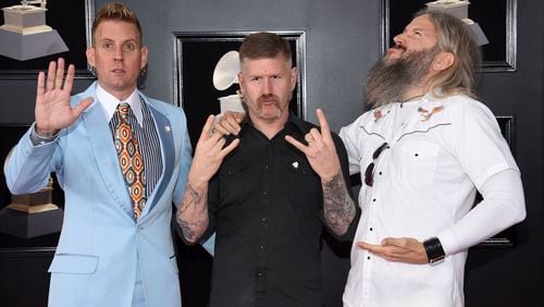 Brann Dailor, from left, Bill Kelliher and Troy Sanders of Mastodon arrive at the 60th annual Grammy Awards at Madison Square Garden on Sunday, Jan. 28, 2018, in New York. (Photo by Evan Agostini/Invision/AP)