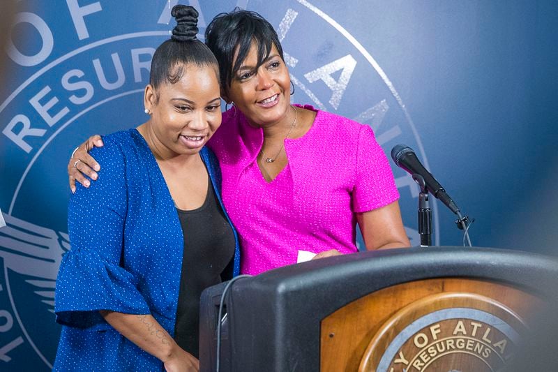 Allison Woods, whose son Isaiah was shot after a football game and remains hospitalized, appeared at a news conference with Atlanta Mayor Keisha Lance Bottoms. AJC photo: Alyssa Pointer