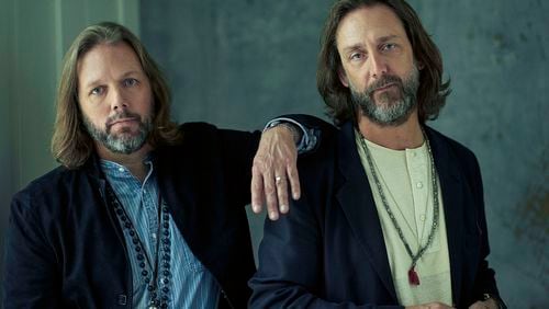 Brothers Rich (left) and Chris Robinson bring their band the Black Crowes to State Farm Arena in October.
(Courtesy of Josh Cheuse)