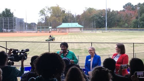 Stacey Abrams (left) and Carolyn Bourdeaux (center) rallied Democrats in Norcross on Thursday.