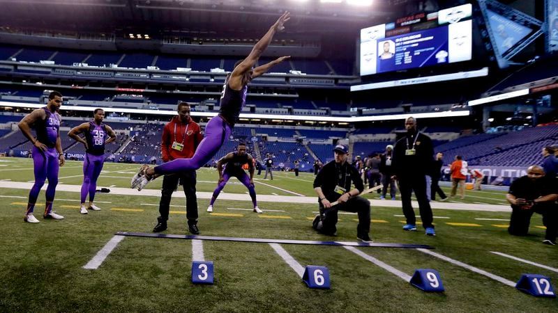 Connecticut defensive back Byron Jones set a world record with his broad jump  at the 2015 NFL scouting combine.