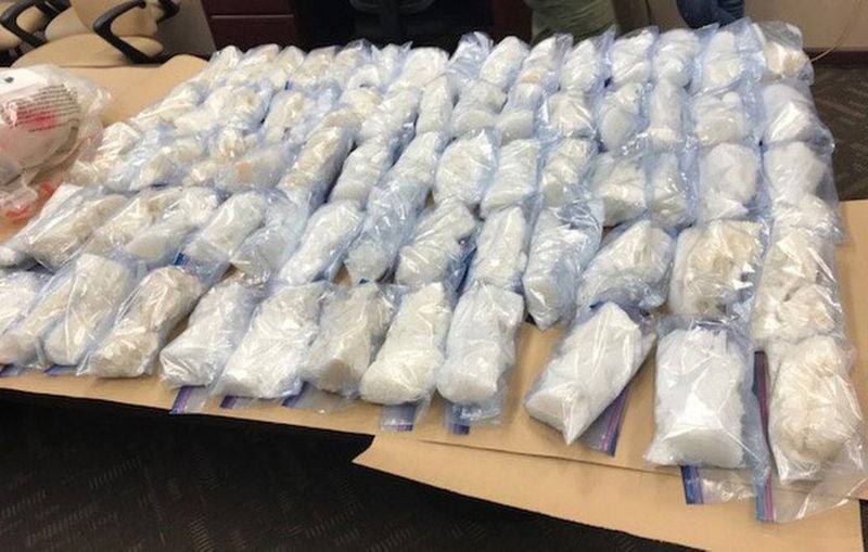 Federal agents arrested two Mexican nationals and a Cleveland man after more than 140 pounds of methamphetamine was seized in Boston Heights believed to be the largest seizure of meth in Ohio’s history. Tyrone Rogers, 36, of Cleveland, Hector Manuel Ramos-Nevarez, 26, and Gilbert Treviso-Garcia, 24, both of Mexico, are charged with conspiracy to possess with the intent to distribute methamphetamine. Investigators seized 82 pounds of crystal meth and 60 pounds of liquid meth from a warehouse near the 7590 block of Olde Eight Road in Boston Heights. (Image courtesy of News 5 Cleveland via the Hudson Police Department)
