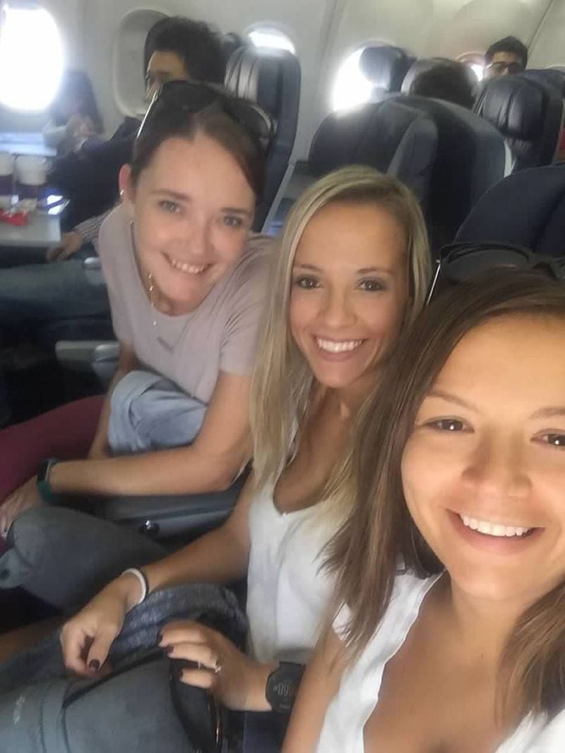 Megan Pepperdine (from left) and her sisters-in-law, Carrie Lozynksy and Angela Goure, on their flight to Las Vegas, two days before the mass shooting at the Route 91 Harvest Music Festival.
(Courtesy of Megan Pepperdine)