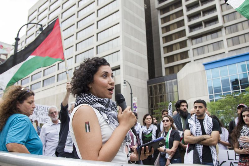 Rozina Gilani, a Jewish Voice for Peace organizer, speaks at the emergency protest for the violence in Gaza in Downtown Atlanta, Georgia, on Tuesday, May 15, 2018. (REANN HUBER/REANN.HUBER@AJC.COM)
