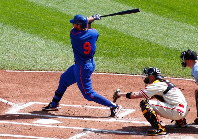 Bright blue and bright orange collide on Mets uniforms